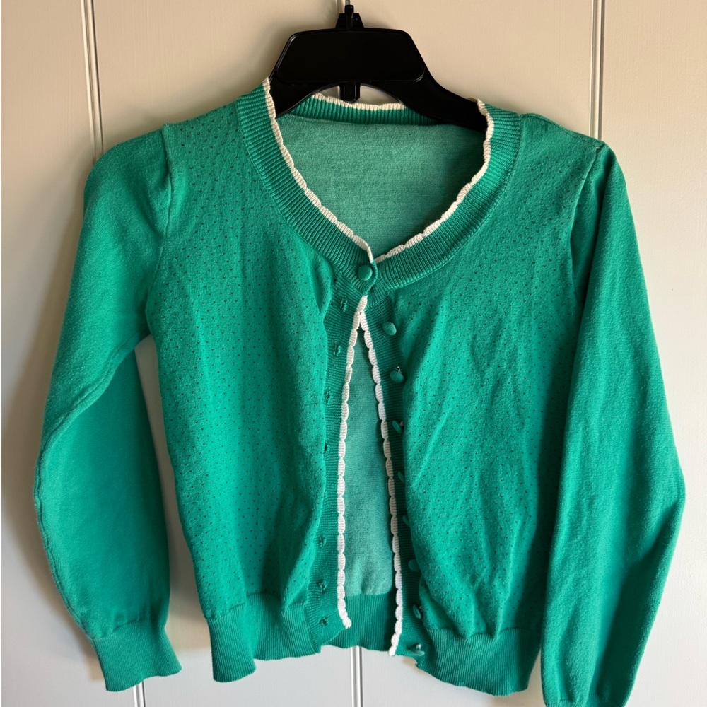 Green cardigan with heart details